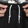 Штани Nike Solo Swoosh DX0815-010
